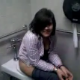 A girl is video-recorded in a public restroom at a Seven-Eleven store. Peeing is audible, and she even puts on a nice singing performance. Over 2 minutes.